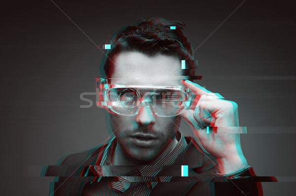 Stock photo: man in virtual reality or 3d glasses with glitch