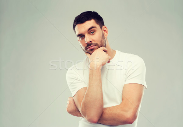 man thinking over gray background Stock photo © dolgachov