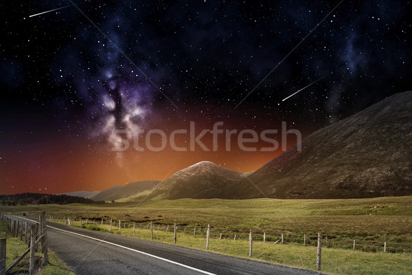 Stock photo: night landscape of road and mountains over space