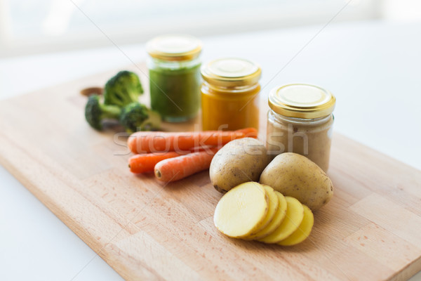 vegetable puree or baby food in glass jars Stock photo © dolgachov
