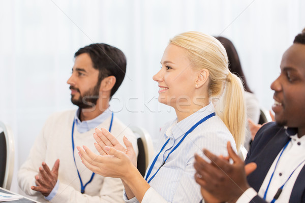 people applauding at business conference Stock photo © dolgachov