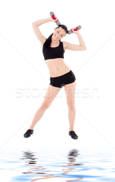 Fitness instructor gantere alb femeie corp Imagine de stoc © dolgachov