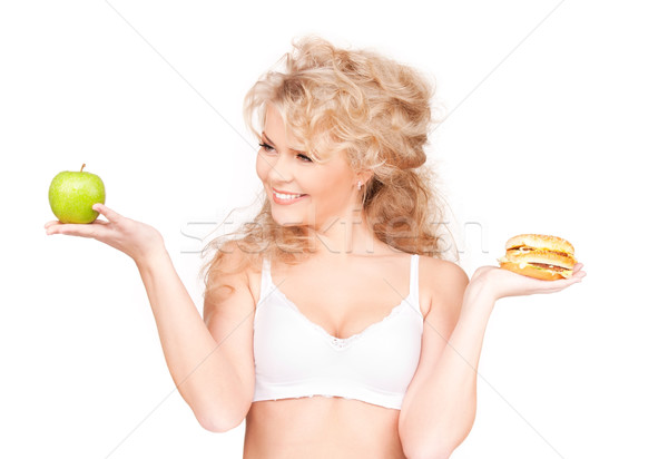 Stock fotó: Nő · választ · hamburger · alma · fiatal · gyönyörű · nő