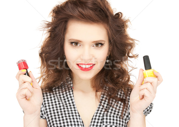 beautiful woman polishing her nails Stock photo © dolgachov