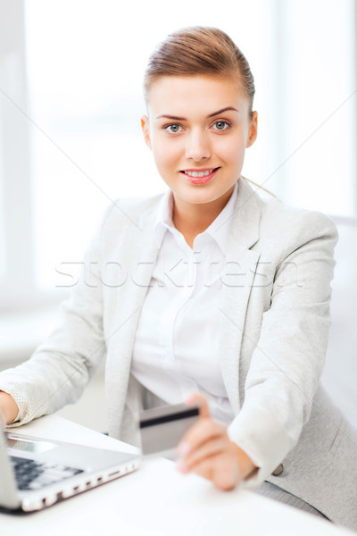 businesswoman with laptop using credit card Stock photo © dolgachov