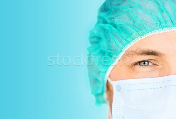 Cirujano médicos CAP máscara Foto mitad Foto stock © dolgachov