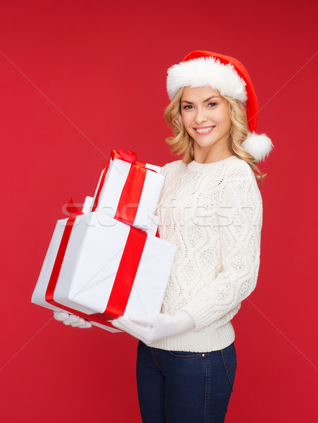 Kadın yardımcı şapka çok hediye kutuları Stok fotoğraf © dolgachov