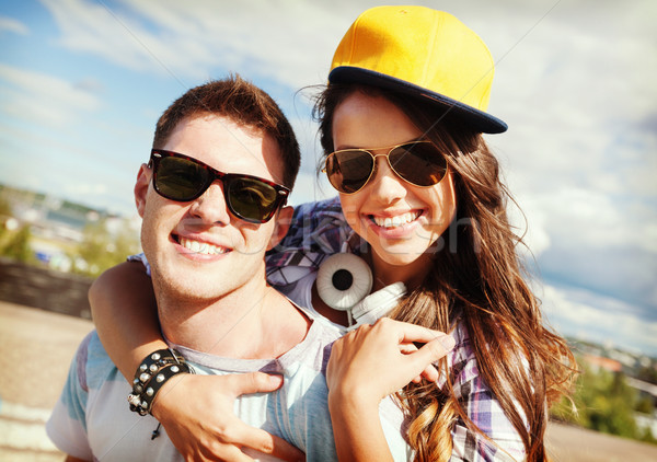 teenagers having fun outside Stock photo © dolgachov