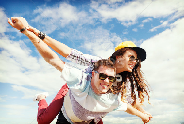 teenagers having fun outside Stock photo © dolgachov