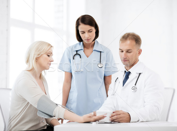 doctor and patient in hospital Stock photo © dolgachov
