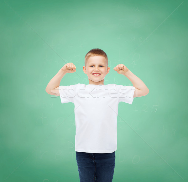Pequeno menino branco tshirt as mãos levantadas infância Foto stock © dolgachov