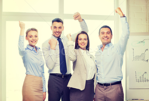 Business team vieren overwinning kantoor business succes Stockfoto © dolgachov