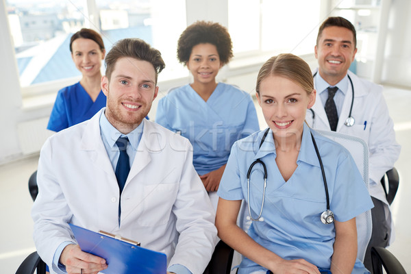 Grupo feliz médicos seminario hospital profesión Foto stock © dolgachov