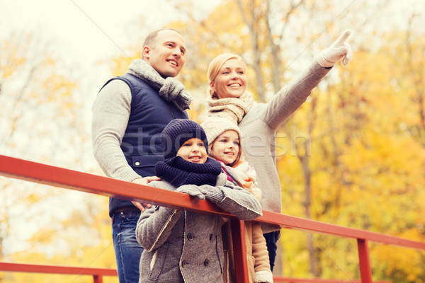 happy family in autumn park Stock photo © dolgachov