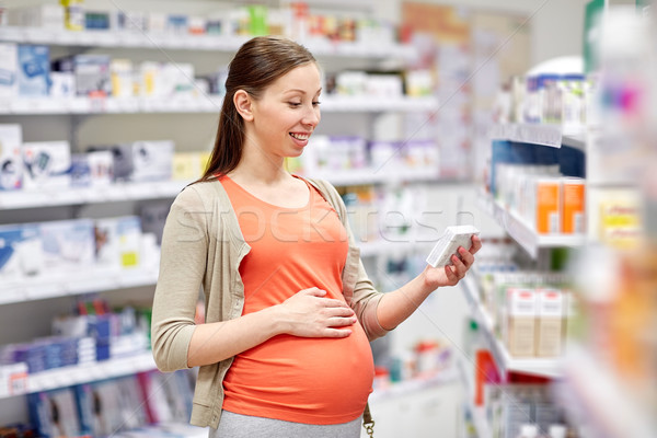 Boldog terhes nő gyógyszer gyógyszertár terhesség gyógyszer Stock fotó © dolgachov