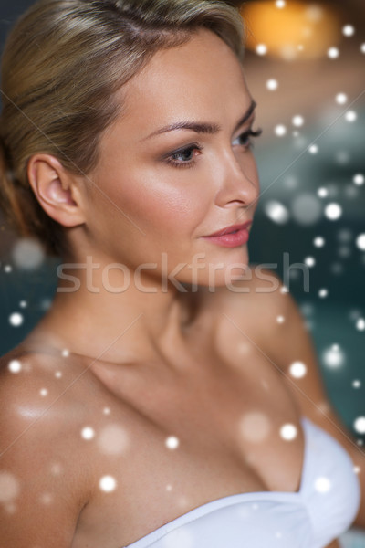 close up of woman in swimsuit at swimming pool Stock photo © dolgachov