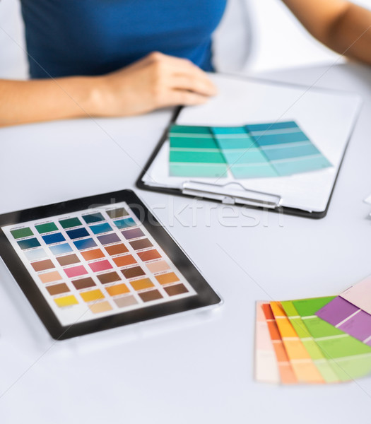 woman working with color samples for selection Stock photo © dolgachov