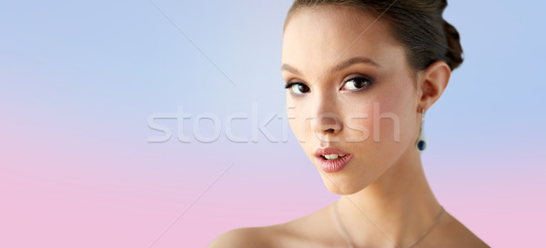 Mujer hermosa cara pendiente belleza personas Foto stock © dolgachov
