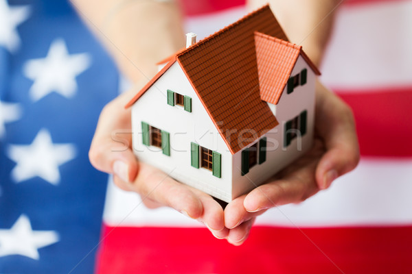 Mãos casa bandeira americana cidadania Foto stock © dolgachov