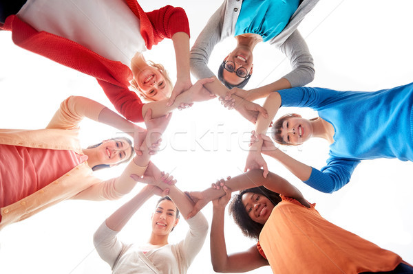 Internaţional grup femei mâini împreună diversitate Imagine de stoc © dolgachov