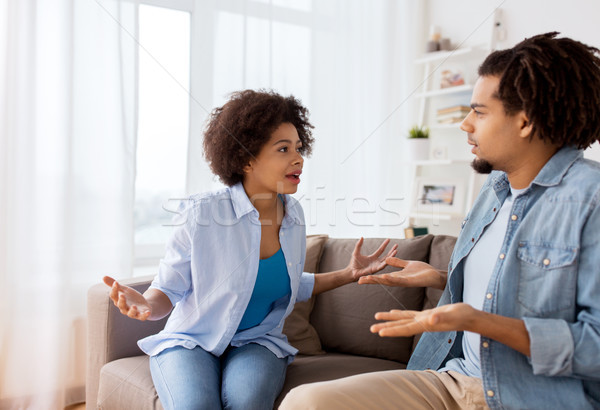 Stock photo: unhappy couple having argument at home