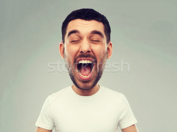 őrült kiált férfi póló szürke érzelmek Stock fotó © dolgachov