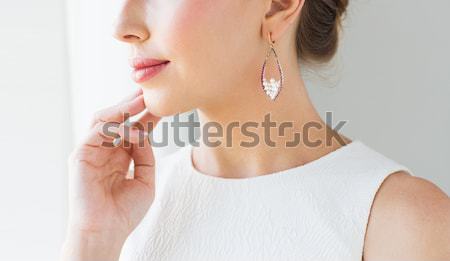 Femme chuchotement potins lumineuses photos jeune femme [[stock_photo]] © dolgachov