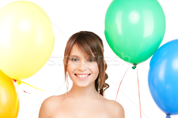 Stock photo: happy teenage girl with balloons