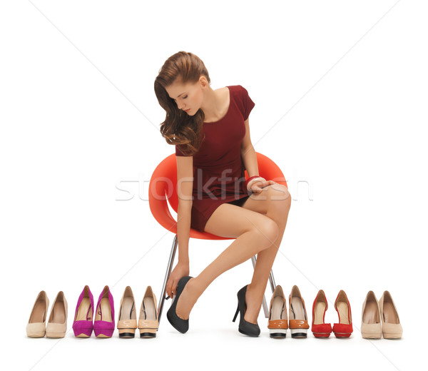 Frau groß Schuhe Bild Sitzung Warenkorb Stock foto © dolgachov