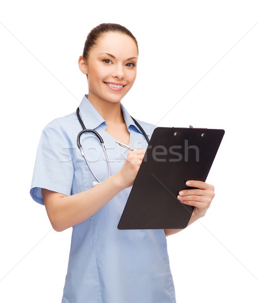 smiling female doctor or nurse with stethoscope Stock photo © dolgachov