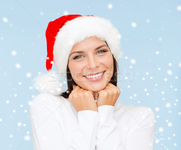 Femme souriante helper chapeau Noël noël Photo stock © dolgachov