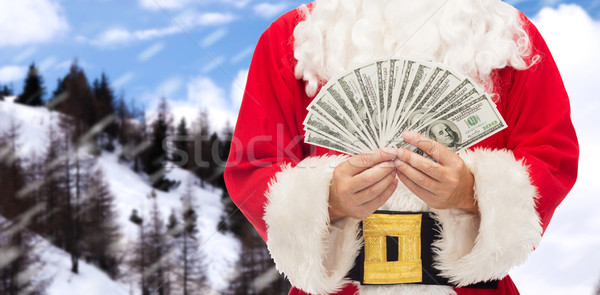 close up of santa claus with dollar money Stock photo © dolgachov