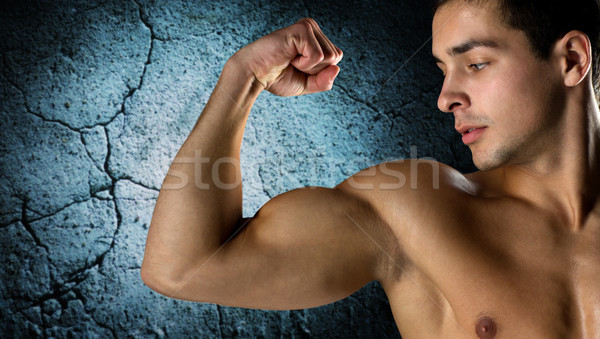 若い男 上腕二頭筋 スポーツ ボディービル ストックフォト © dolgachov
