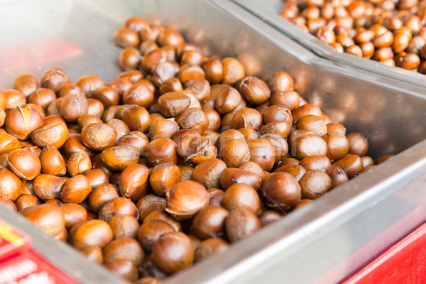 chestnuts at asian street market Stock photo © dolgachov