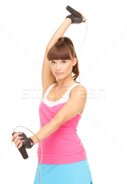 fitness instructor with jump rope Stock photo © dolgachov