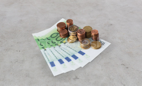 Közelkép Euro papír pénz érmék asztal Stock fotó © dolgachov