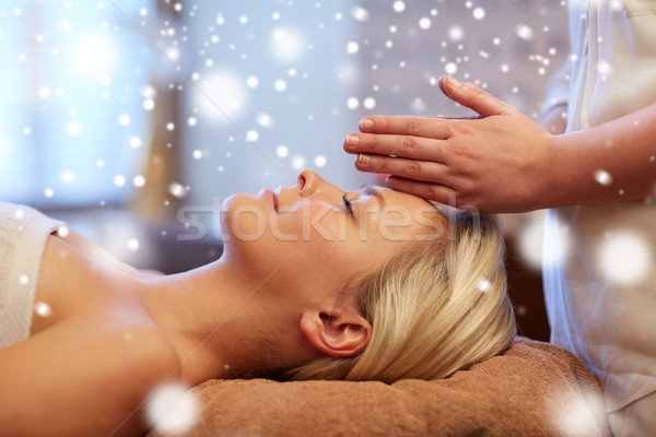 close up of woman having face massage in spa salon Stock photo © dolgachov