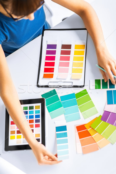 woman working with color samples for selection Stock photo © dolgachov