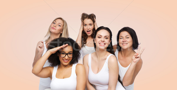 Stock photo: group of happy women in white underwear having fun