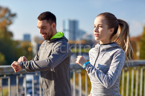 couple running over city highway bridge Stock photo © dolgachov