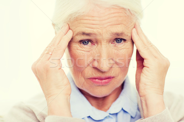 Cara senior mulher sofrimento dor de cabeça Foto stock © dolgachov