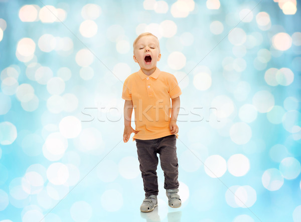 Boldog kicsi fiú kiált gyermekkor érzelem Stock fotó © dolgachov
