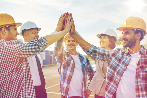 Stockfoto: Bouwers · high · five · business · gebouw