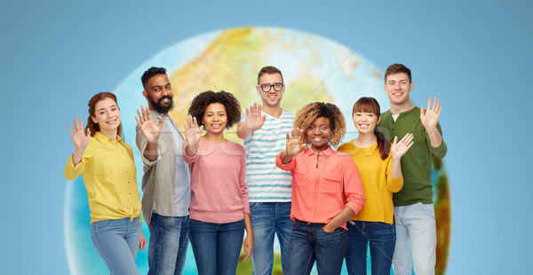 international group of happy people waving hand Stock photo © dolgachov