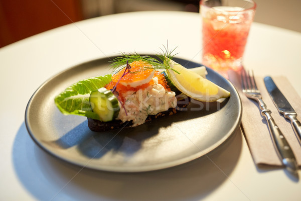 close up of toast skagen with caviar and bread Stock photo © dolgachov