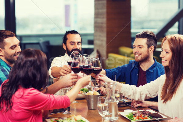 Stok fotoğraf: Arkadaşlar · yemek · içme · şarap · restoran · boş