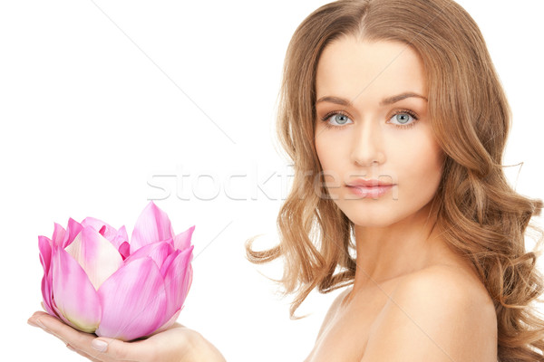 Stock photo: beautiful woman with lotus flower