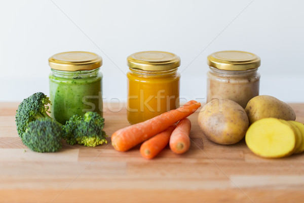 vegetable puree or baby food in glass jars Stock photo © dolgachov