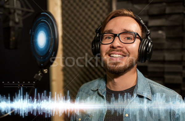Férfi fejhallgató énekel zenei stúdió zene előadás Stock fotó © dolgachov