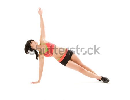 woman practicing ashtanga yoga posture Stock photo © dolgachov